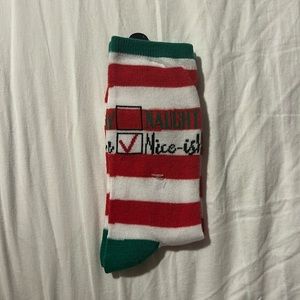 Naughty or nice socks. One size. Red stripes with green accents.